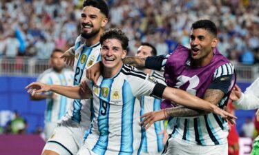 Argentina's forward (10) Lionel Messi runs with the ball followed by Switzerland's forward  Zeki Amdouni (23) during the 2026 World Cup football tournament quarter-final match between Argentina and Switzerland at the Kansas City Stadium in Kansas City on July 11