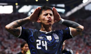 Lautaro Martínez heads the winning goal past England's Jordan Pickford in second-half stoppage time.
