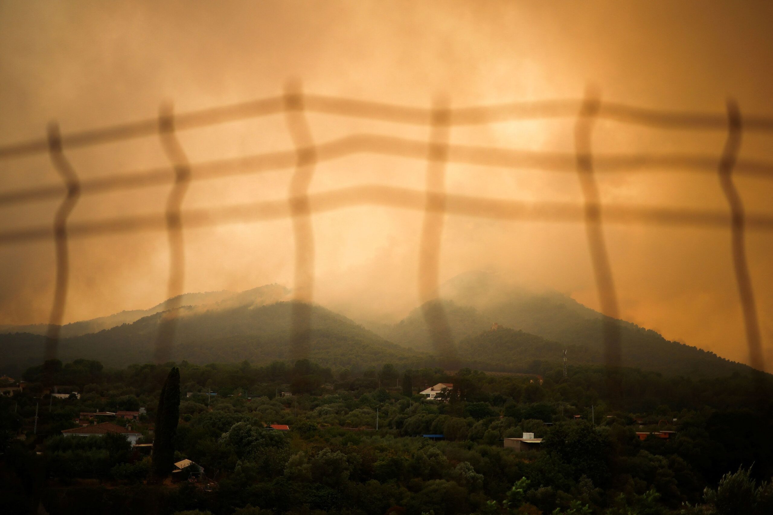 <i>REUTERS/Pedro Nunes via CNN Newsource</i><br/>A view of a wildfire on a mountain in Onda