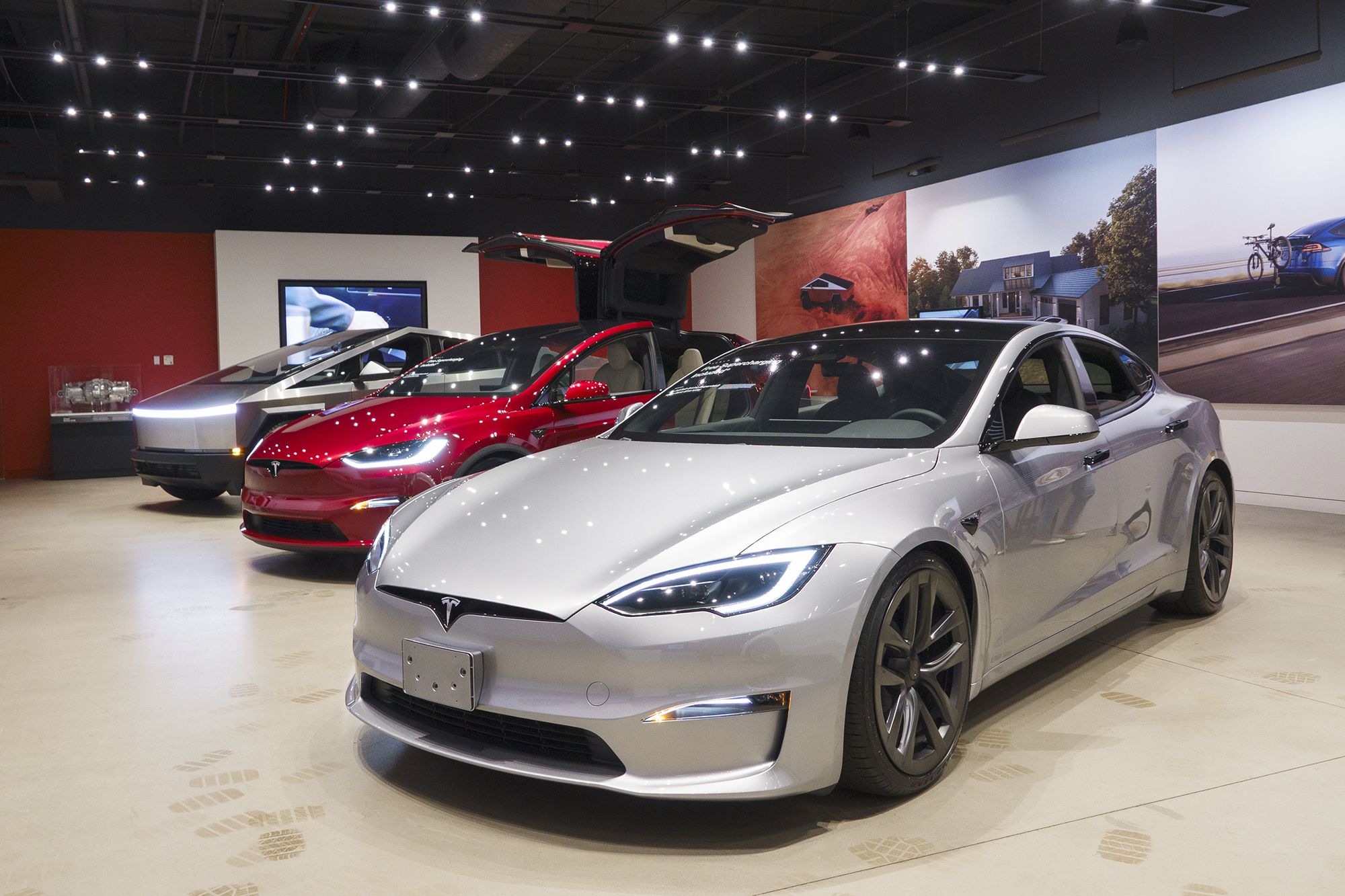 <i>Kevin Carter/Getty Images via CNN Newsource</i><br/>Tesla vehicles are displayed at a showroom in May 2025 in San Diego
