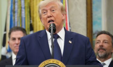 President Donald Trump speaks after ringing the opening bell for the New York Stock Exchange and the Nasdaq in the Oval Office at the White House