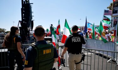 Police officers and members of the FBI are seen outside Los Angeles Stadium before a World Cup match between Iran and New Zealand on June 15.