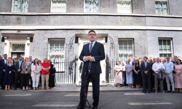 Andy Burnham speaks to staff and media outside 10 Downing Street in London on Monday.