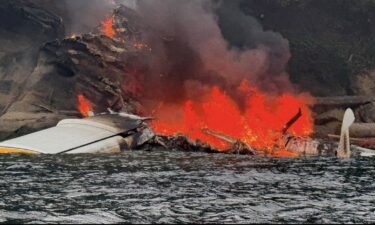 The Kenmore Air seaplane made an emergency landing in North Beach Shallow Bay before catching fire