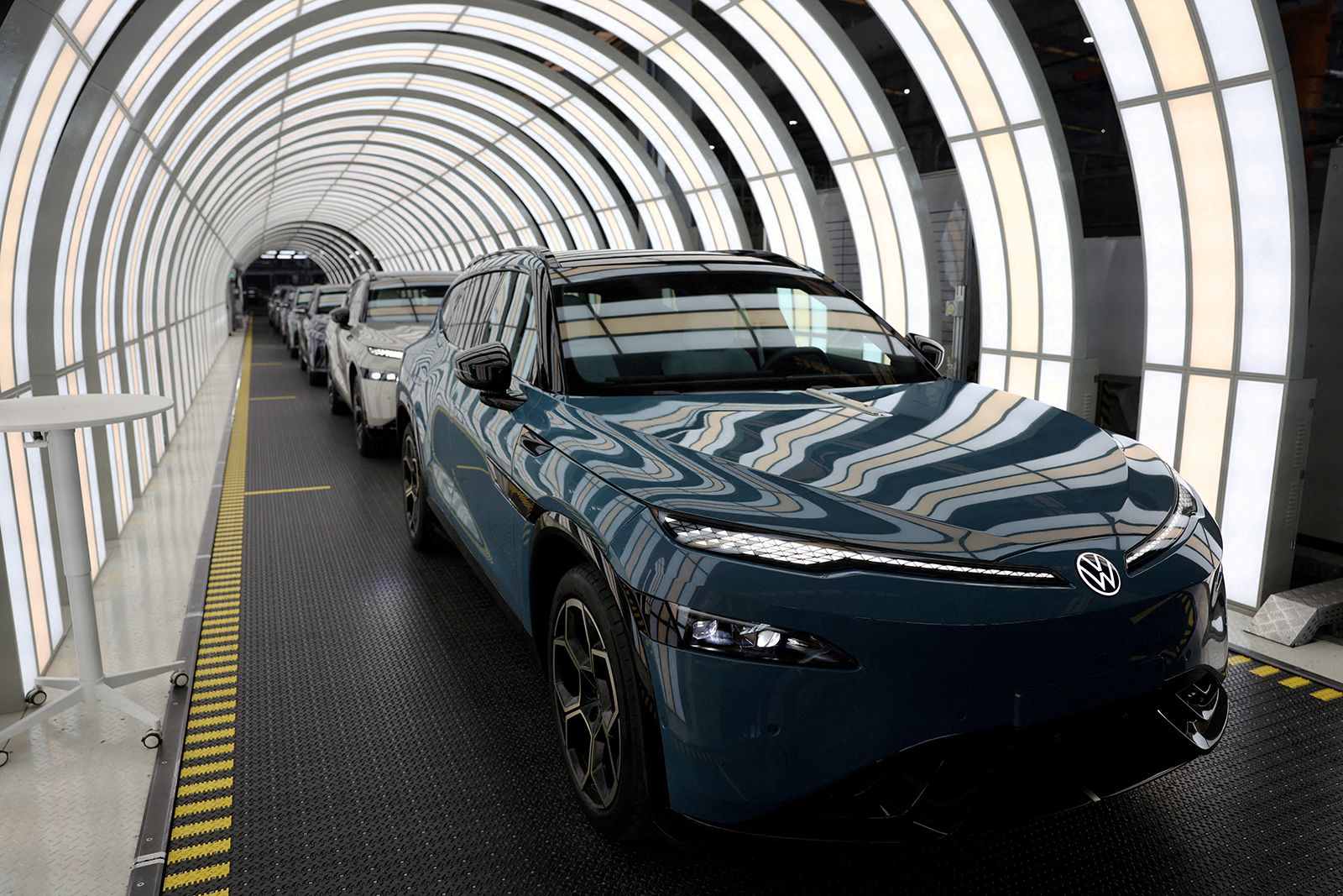 <i>Florence Lo/Reuters/File via CNN Newsource</i><br/>A Volkswagen electric vehicle pictured on the production line at the company's factory in Hefei