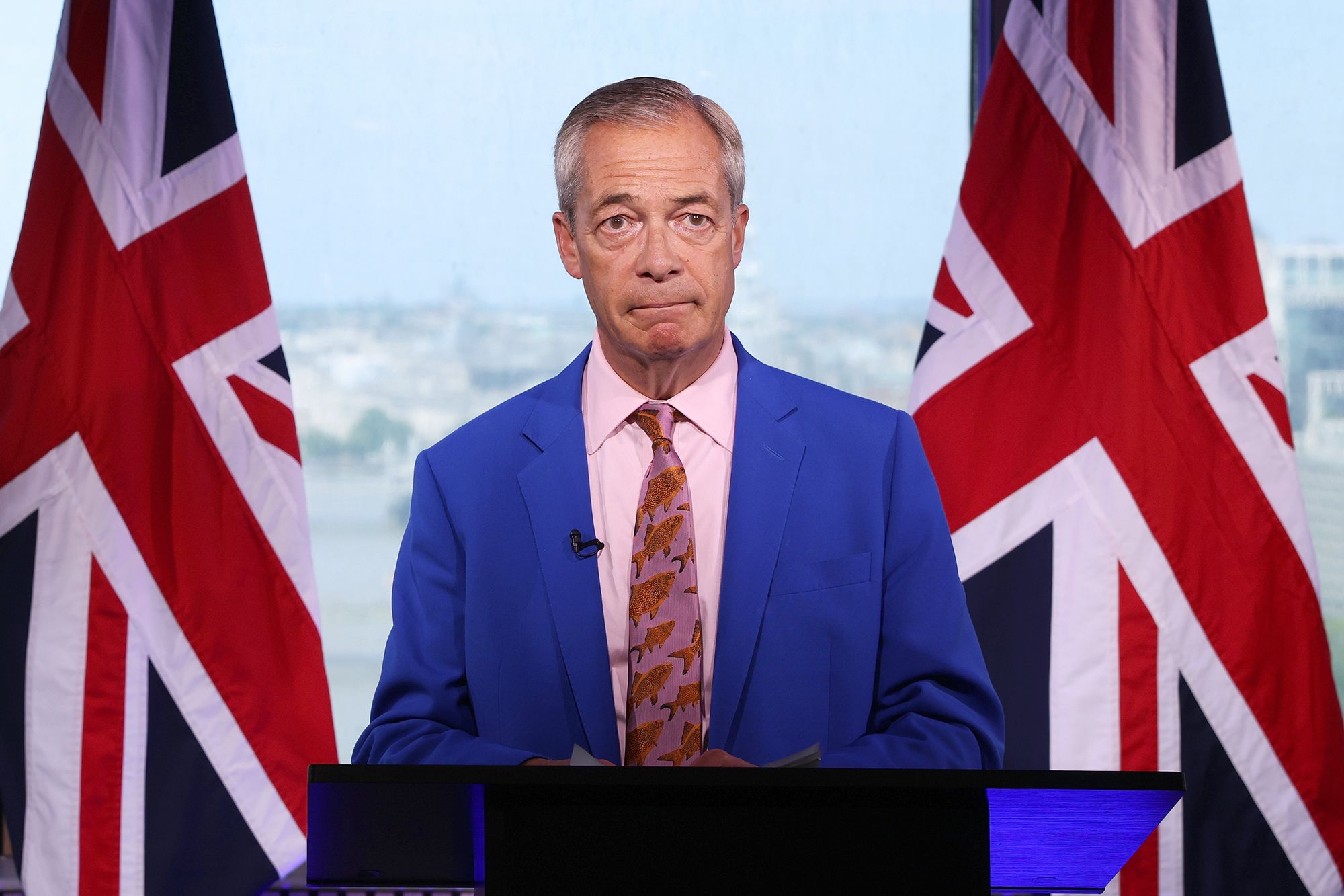 <i>Dan Kitwood/Getty Images via CNN Newsource</i><br/>Reform UK Leader Nigel Farage delivers a statement on his "future in public life" at Millbank Tower