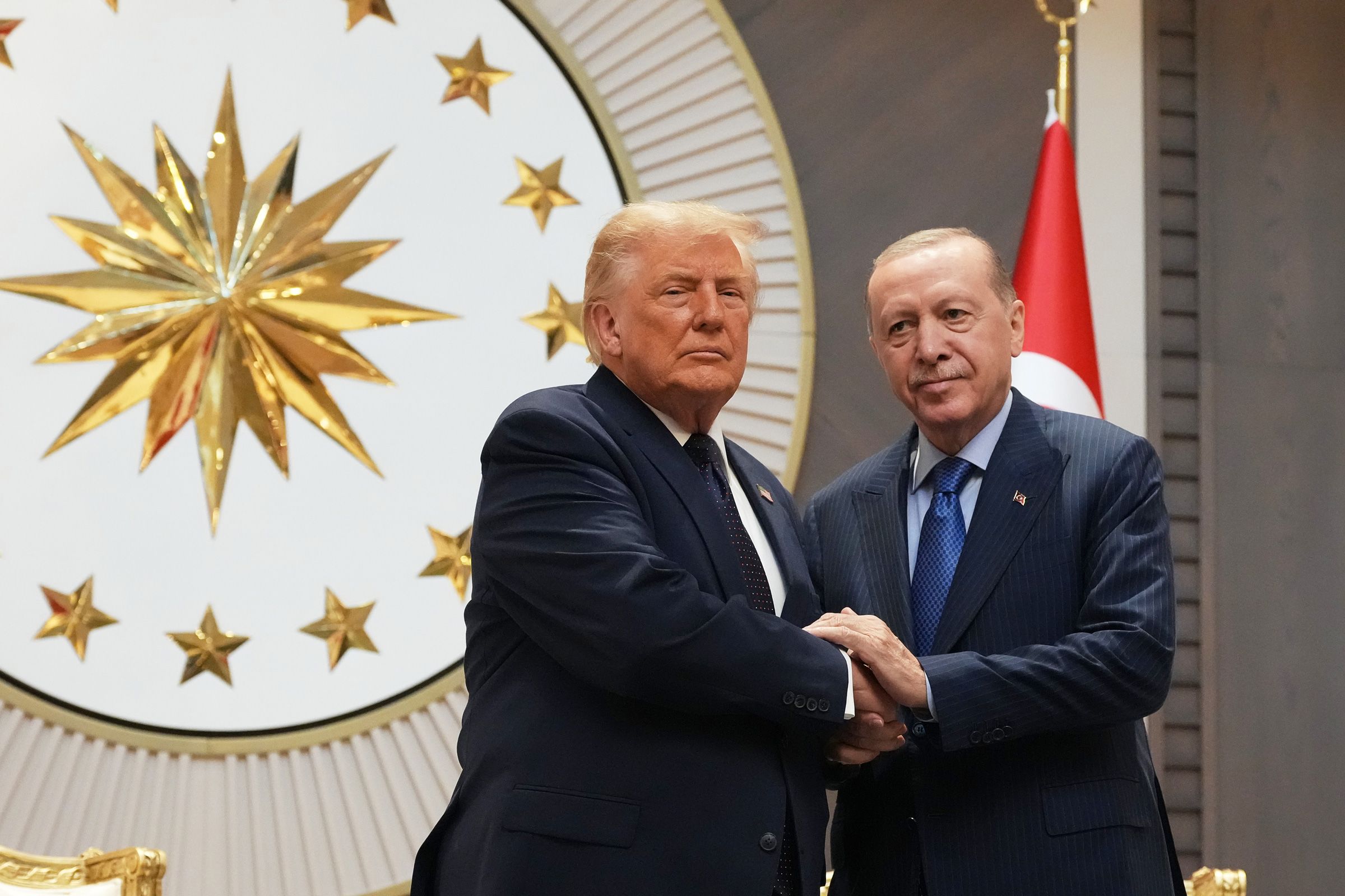 <i>Alex Brandon/AP via CNN Newsource</i><br/>President Donald Trump shakes hands with Turkish President Recep Tayyip Erdogan upon arriving for the NATO summit in Ankara