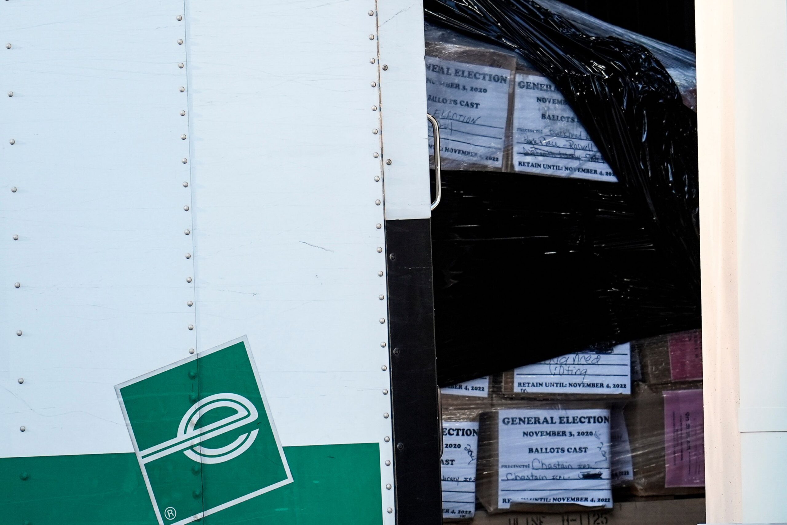 <i>Mike Stewart/AP via CNN Newsource</i><br/>Georgia general election 2020 ballots are loaded by the FBI onto trucks at the Fulton County Election HUB