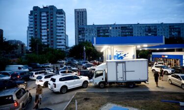 Long queues form outside fuel stations from the early hours of the morning in Novosibirsk
