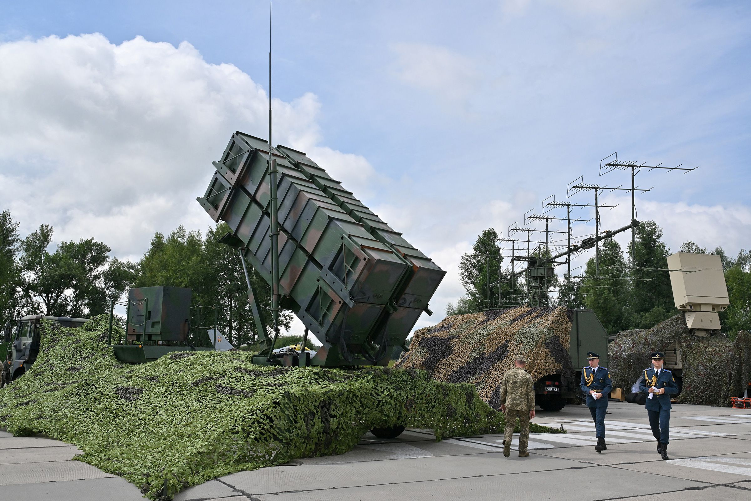 <i>Alina Smutko/Reuters via CNN Newsource</i><br/>Search and rescue teams work at the site of a Russian missile and drone strike in Kyiv on July 7