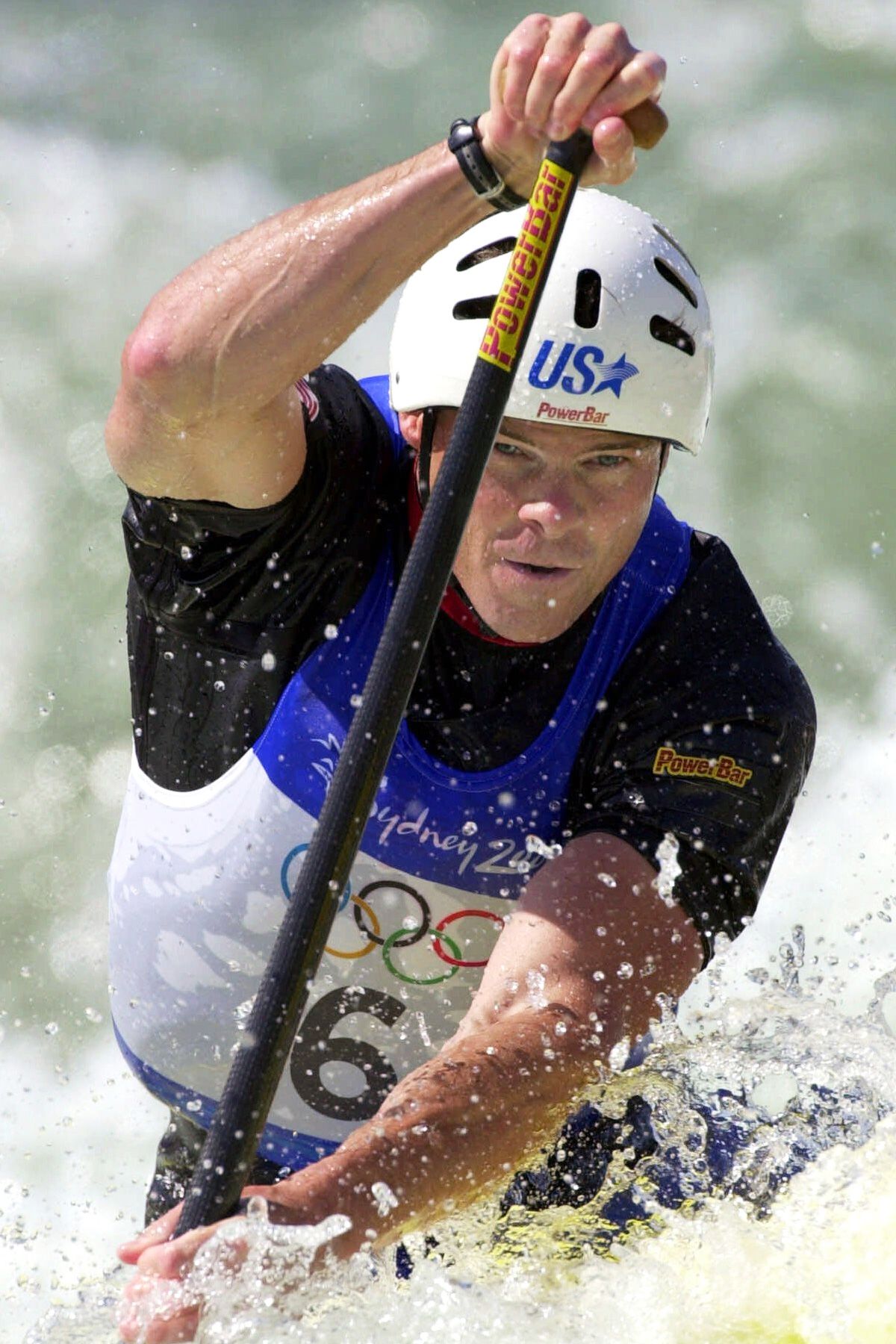 <i>Koji Sasahara/AP/File via CNN Newsource</i><br/>Olympic canoeist David Hearn makes his way through the C1 slalom course at Whitewater Stadium in Penrith