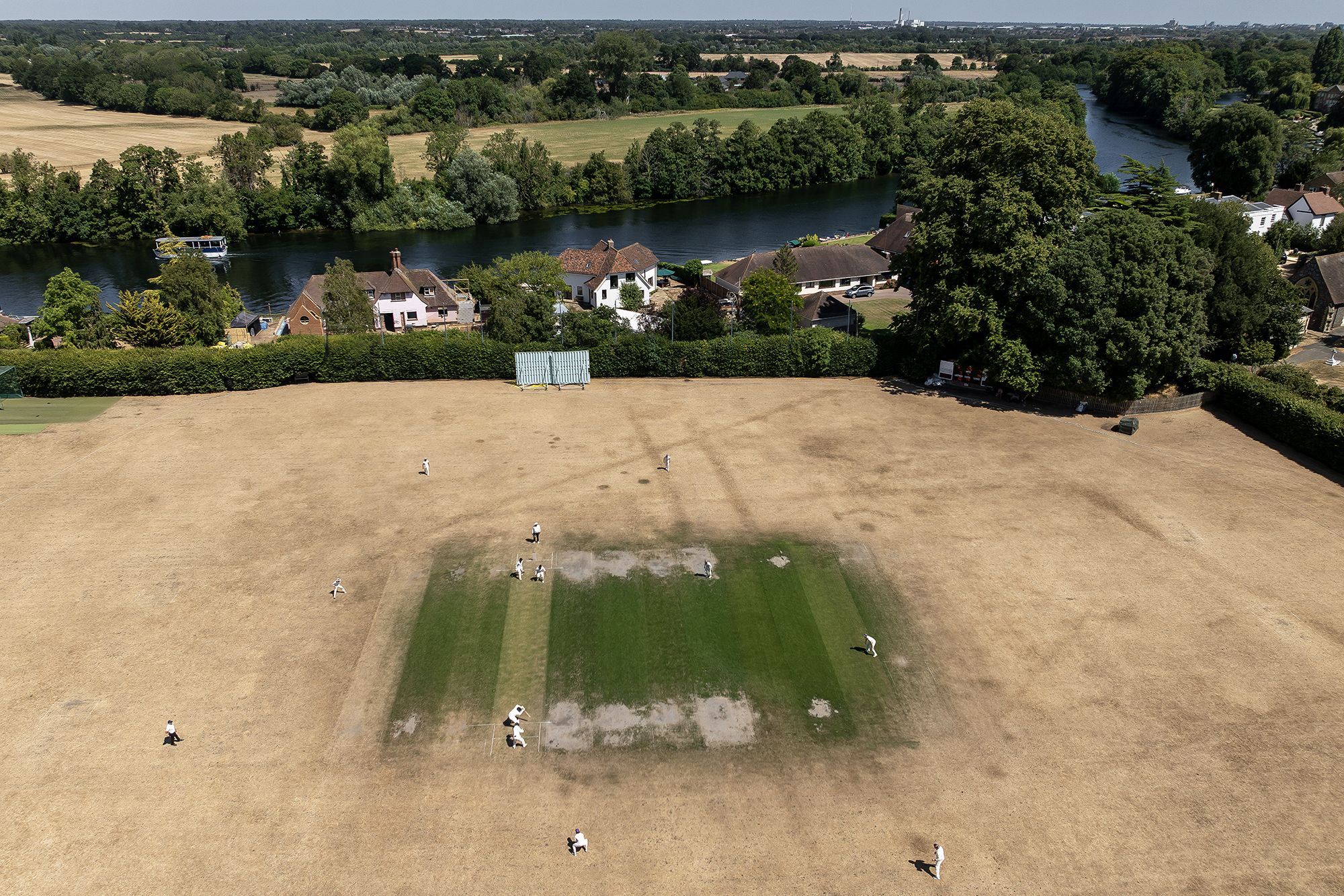 <i>Dan Kitwood/Getty Images via CNN Newsource</i><br/>The contrast between the scorched grass dominating the landscape and the greenery England is used to is stark.