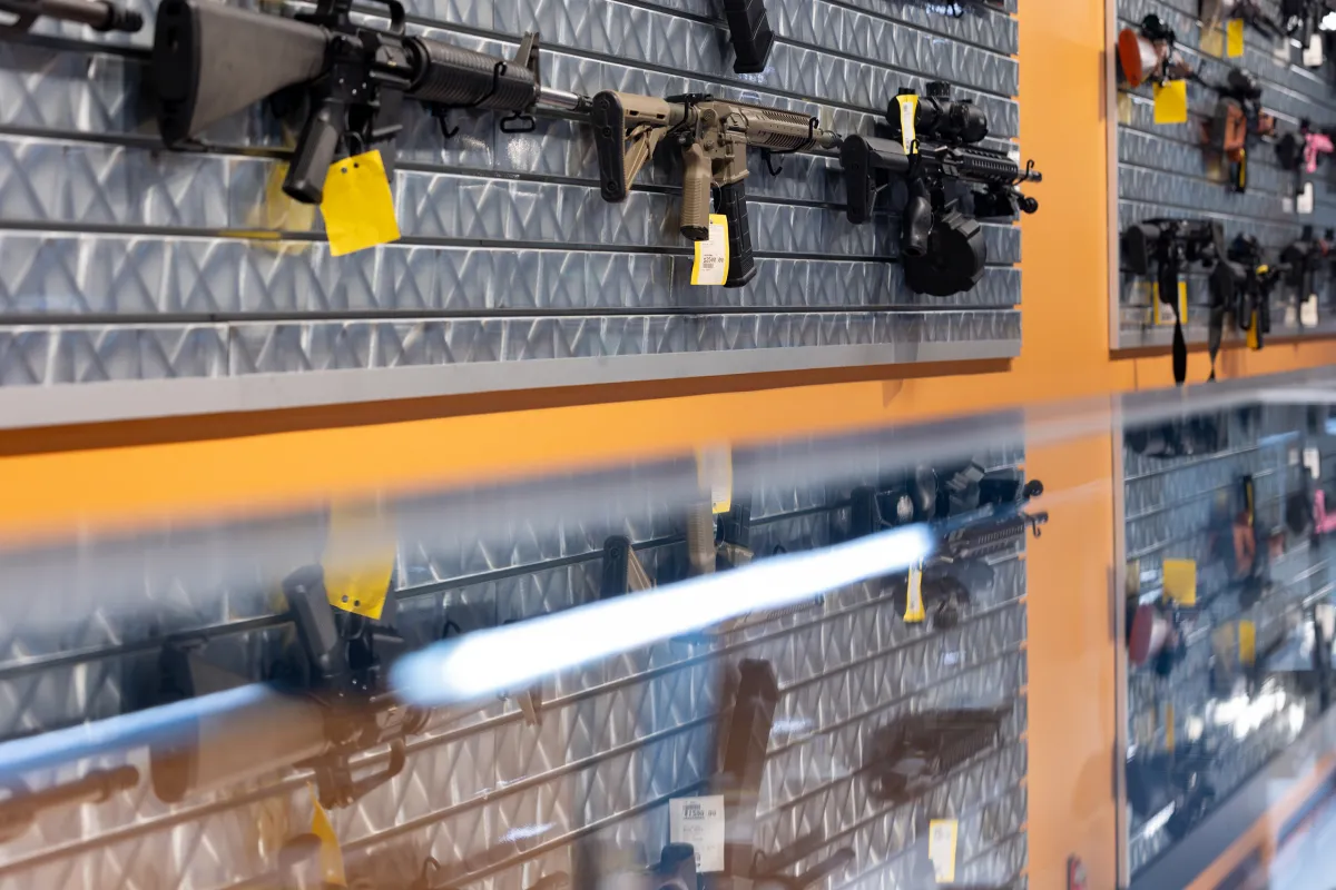 Rifles line the walls of the Frisco Gun Club in Frisco on May 1, 2024.