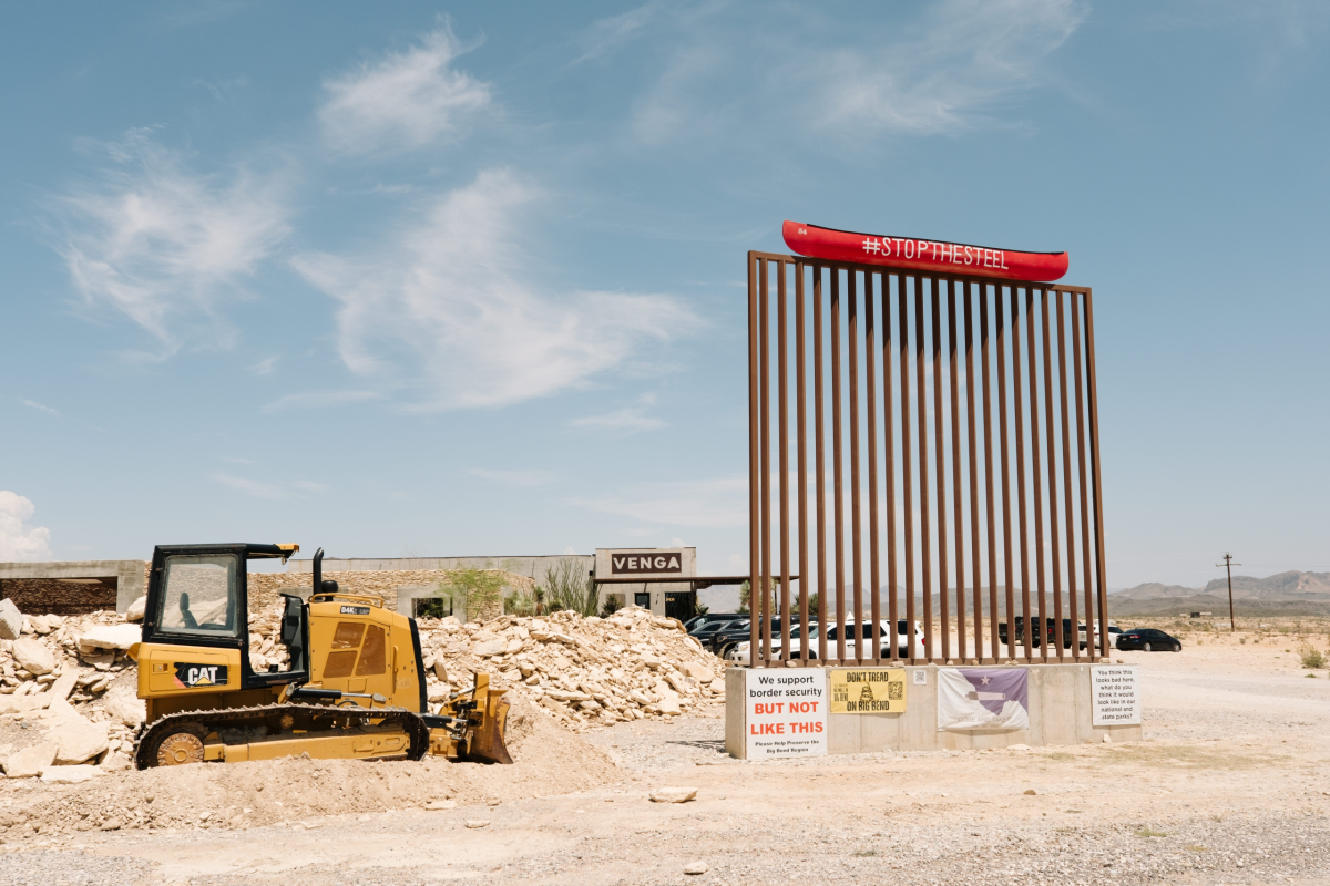 A mock border wall stands in front of Venga Coffee in Terlingua Wednesday, Aug. 12, 2026.