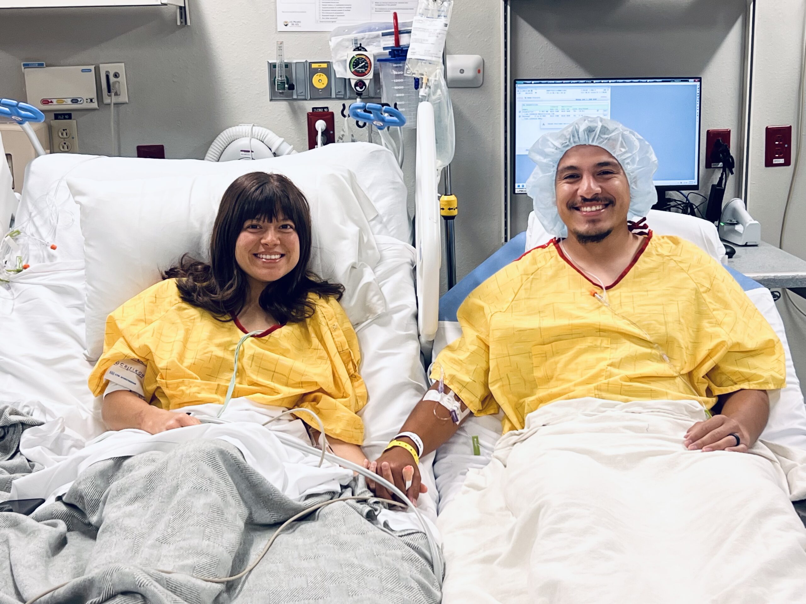 Caitlyn and Christian Campa hold hands at Las Palmas Medical Center follwing their kidney transplant operation on June 1, 2026