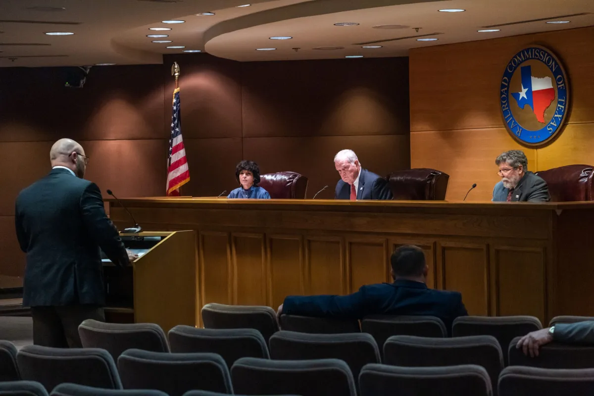 From left to right: Texas Railroad commissioners Christi Craddick, Wayne Christian and Jim Wright during an agency hearing in Austin on Nov. 30, 2021.