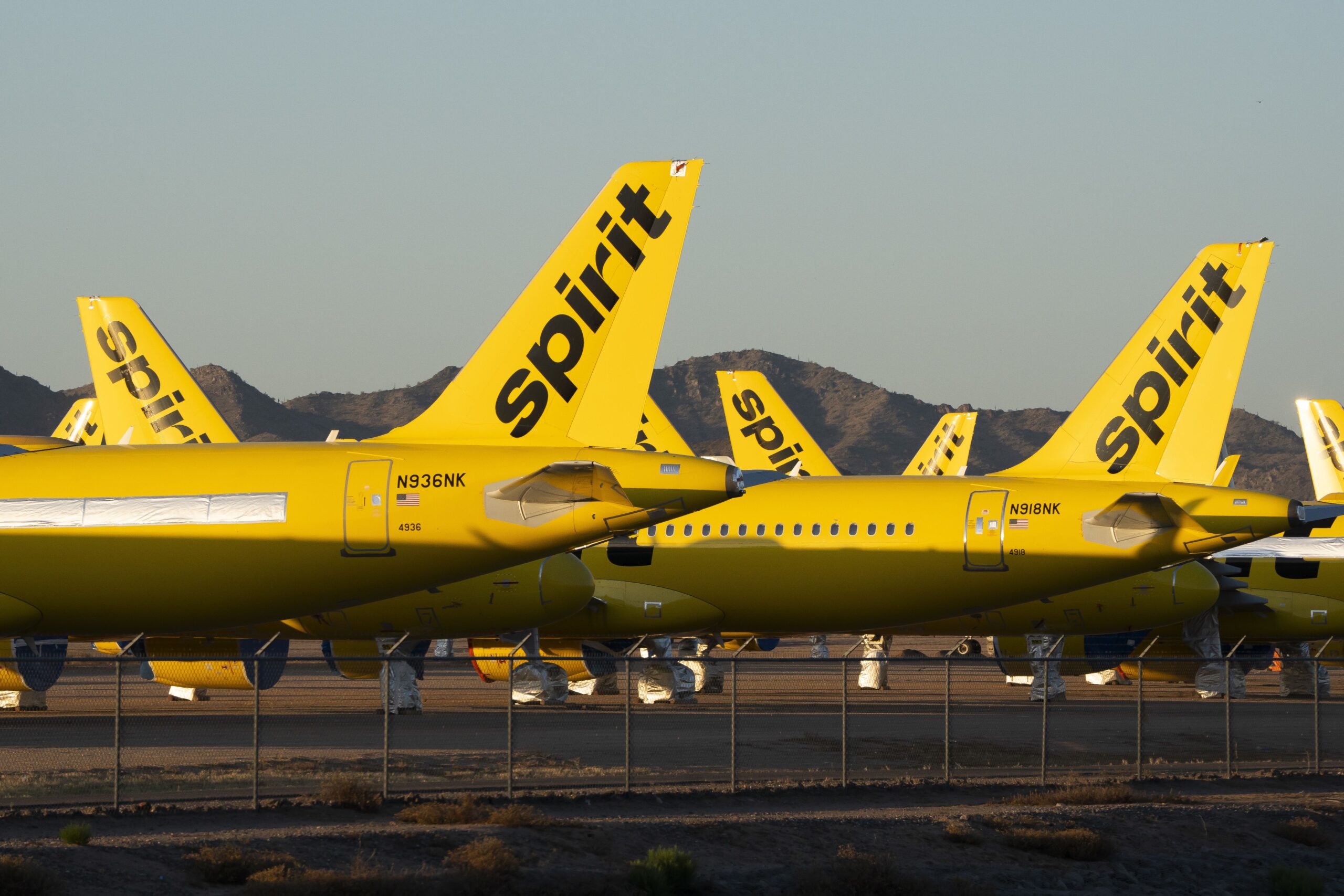 <i>Rebecca Noble/Getty Images via CNN Newsource</i><br/>Spirit Airlines planes sit parked at the Phoenix Goodyear Airport in Goodyear