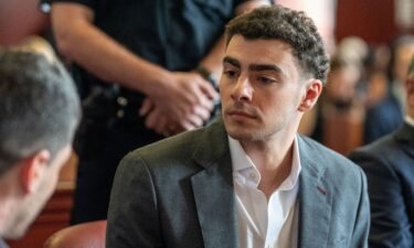 Luigi Mangione attends a pre-trial appearance at Manhattan Criminal Court in New York on Tuesday.
