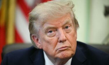 President Donald Trump speaks in the Oval Office of the White House on August 6. The Trump administration is enlisting private companies to conduct cyberattacks on foreign cybercriminals in a major policy shift that experts say could come with legal risk for the companies.