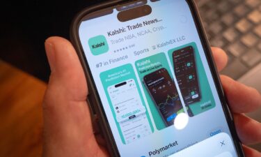 An app for Kalshi is shown on a phone in Chicago
