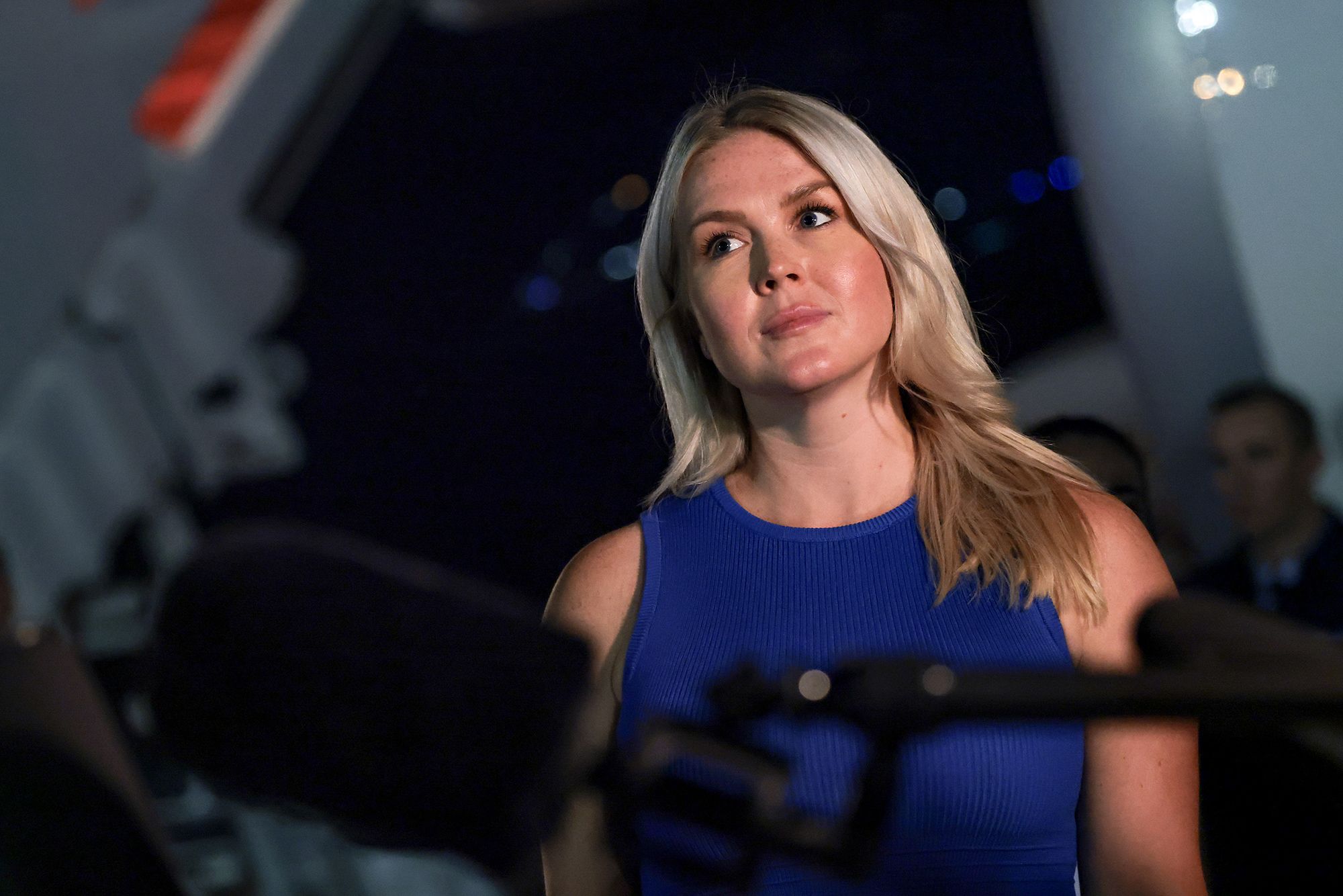 <i>Anna Moneymaker/Getty Images via CNN Newsource</i><br/>White House Press Secretary Karoline Leavitt looks on as President Donald Trump speaks to reporters after stepping off Air Force One on August 11