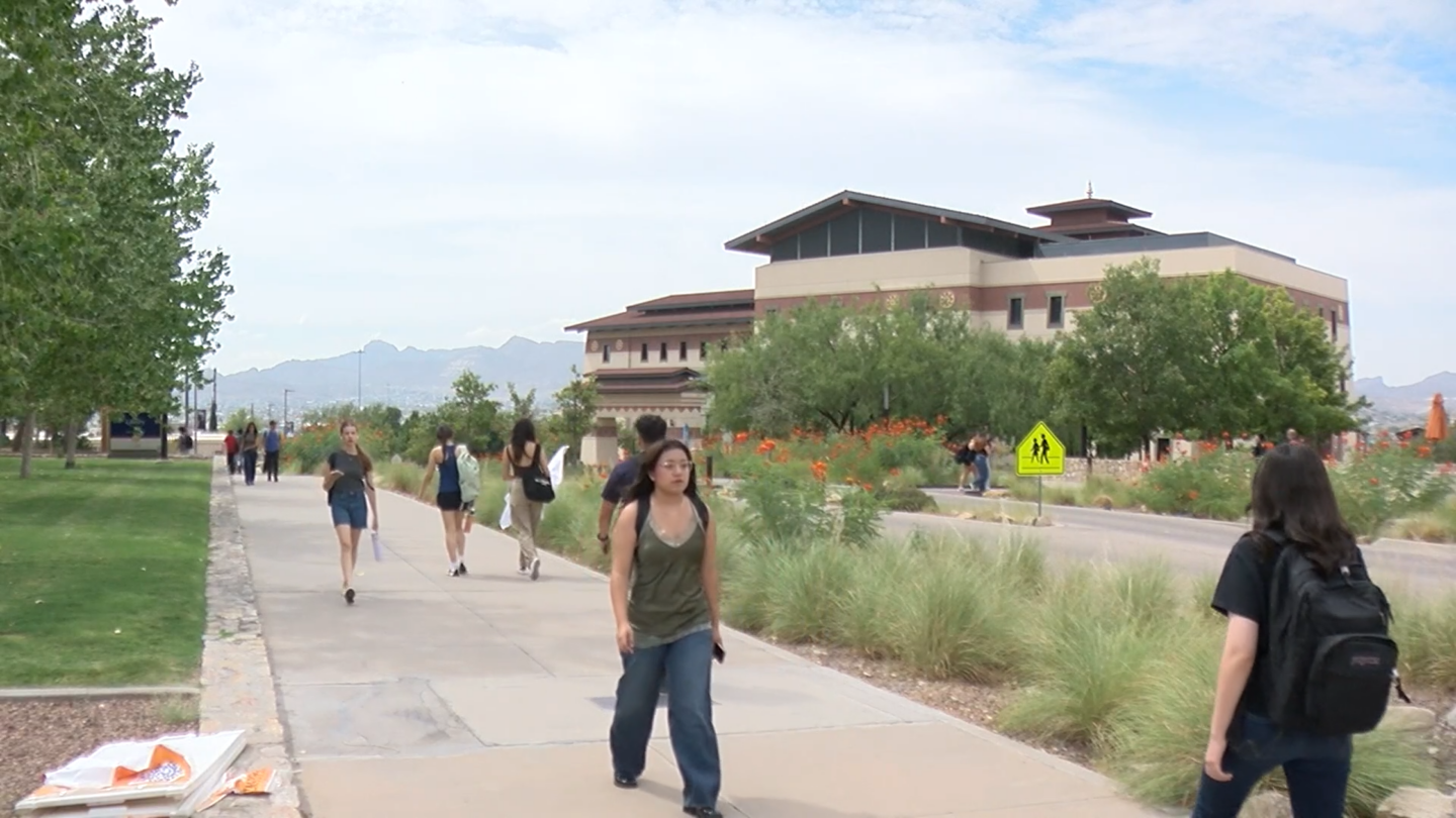 Students walking on the UTEP campus.