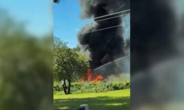 Witness video captures the aftermath of a military F-16 fighter jet crash in Michigan on September 17.
