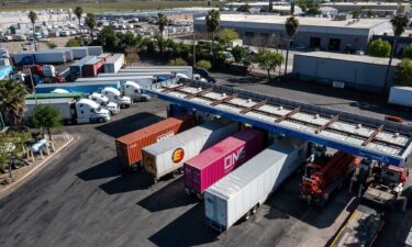 Drivers refuel tractor trailers with diesel fuel at a Chevron truck stop in Tracy