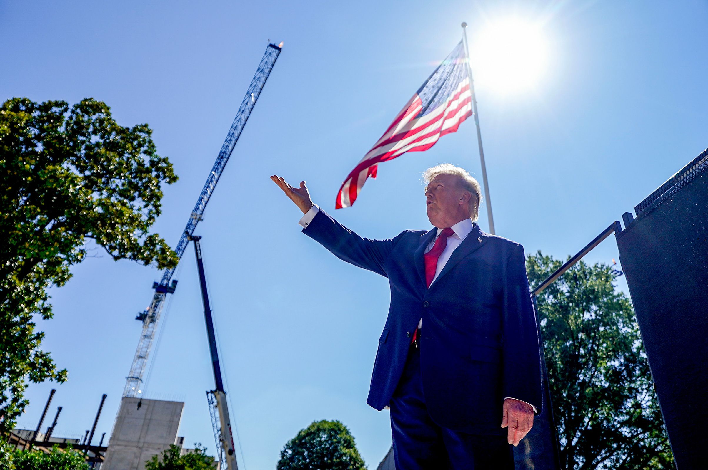 <i>Al Drago/Bloomberg/Getty Images/File via CNN Newsource</i><br/>President Donald Trump speaks to members of the media near the White House helipad construction