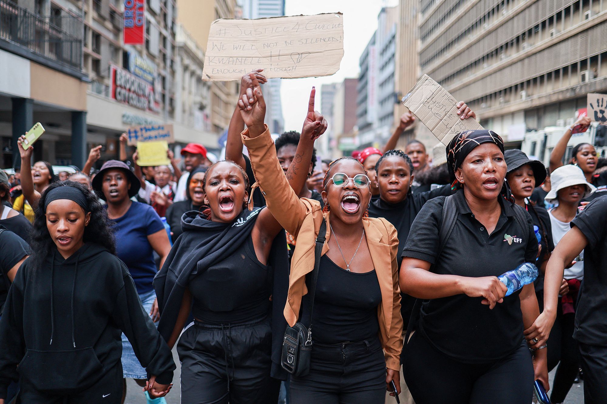 <i>Phill Magakoe/AFP/Getty Images via CNN Newsource</i><br/>Protesters sing and chant during a demonstration calling for gender-based violence and femicide to be declared a national disaster at the Union Buildings in Pretoria on April 11