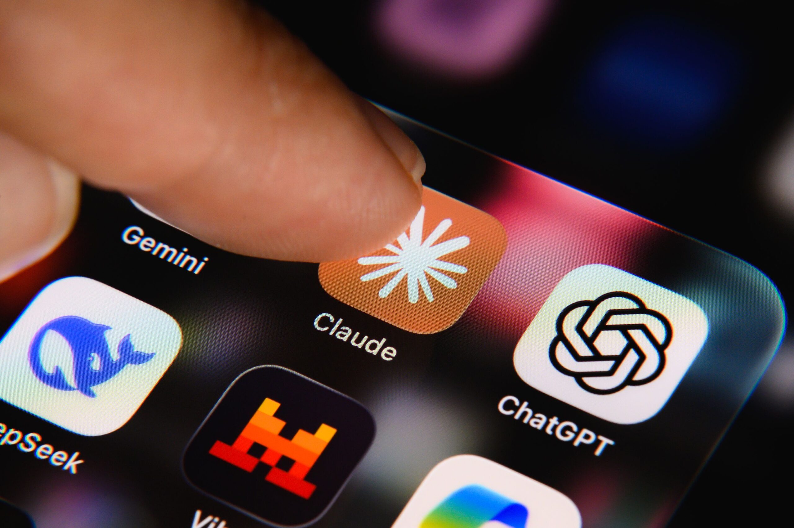 <i>Samuel Boivin/NurPhoto/Getty Images via CNN Newsource</i><br/>A finger is about to tap the Claude app icon on a smartphone screen in Creteil