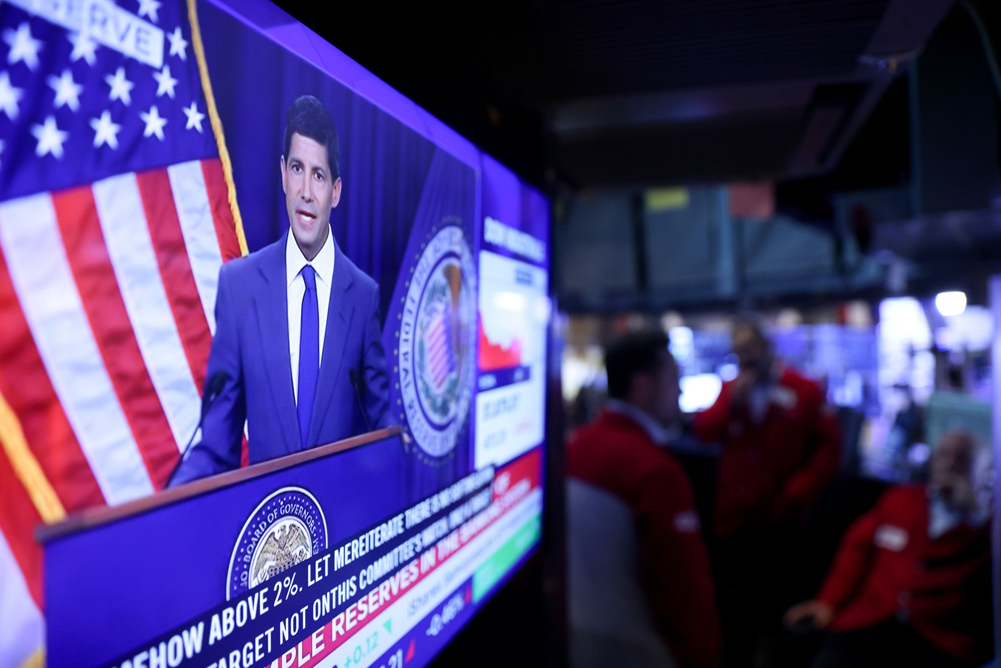 <i>Michael Nagle/Bloomberg/Getty Images via CNN Newsource</i><br/>A television station on the floor of the New York Stock Exchange broadcasts Federal Reserve Chairman Kevin Warsh speaking after a Federal Open Market Committee meeting on July 29.