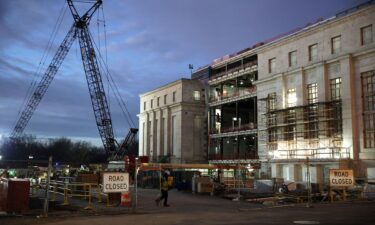 Workers are seen at the Federal Reserve renovation site on January 14