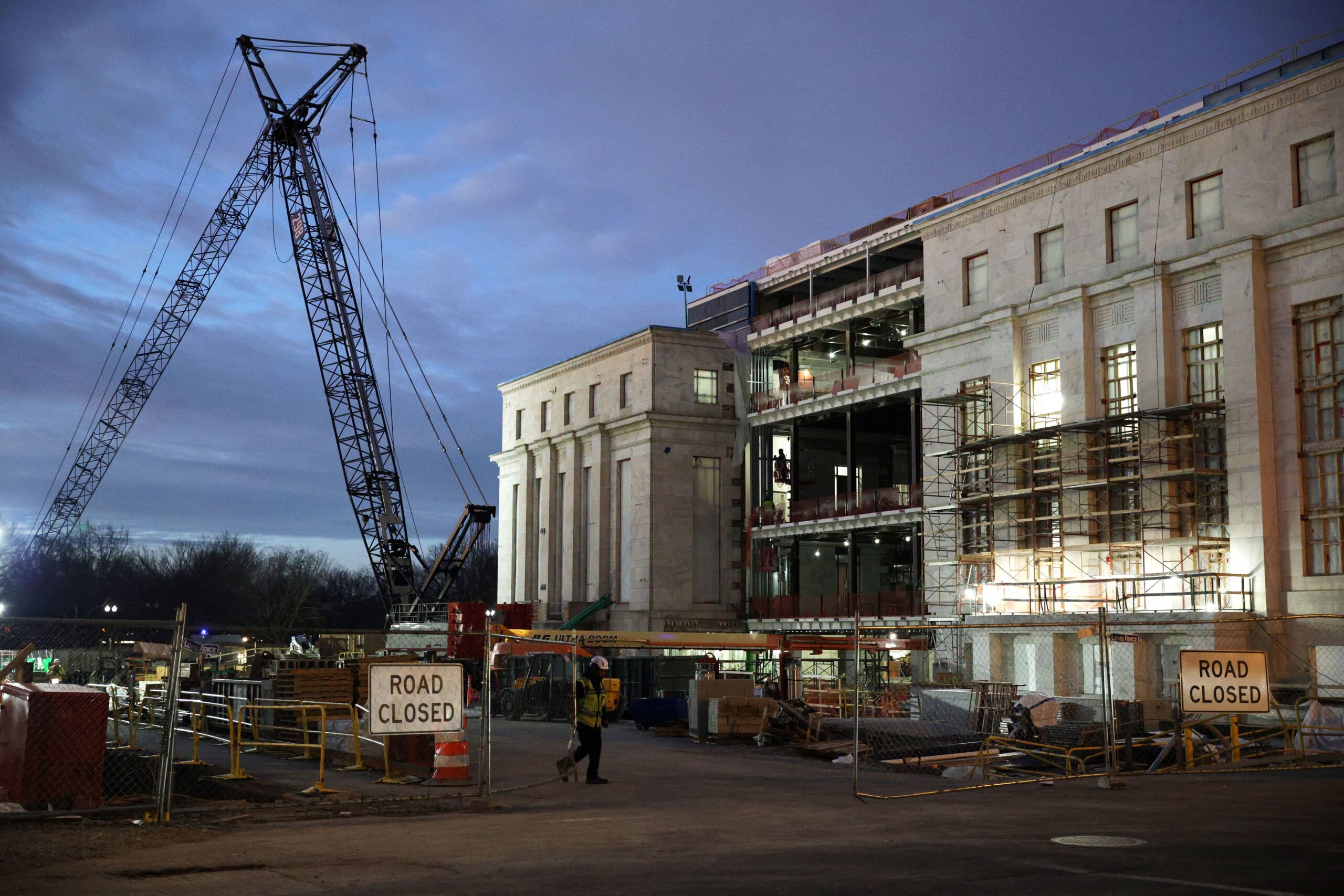 <i>Alex Wong/Getty Images via CNN Newsource</i><br/>Workers are seen at the Federal Reserve renovation site on January 14