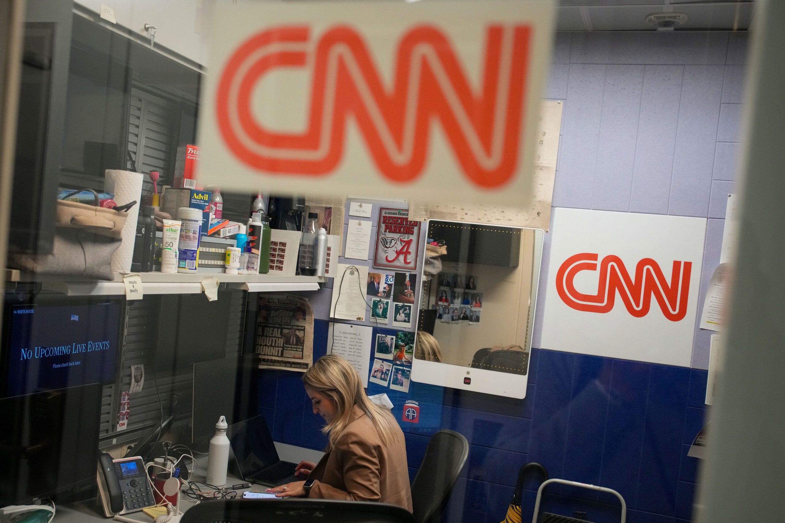 <i>Andrew Harnik/Getty Images via CNN Newsource</i><br/>CNN Senior White House Reporter Betsy Klein works in the CNN office