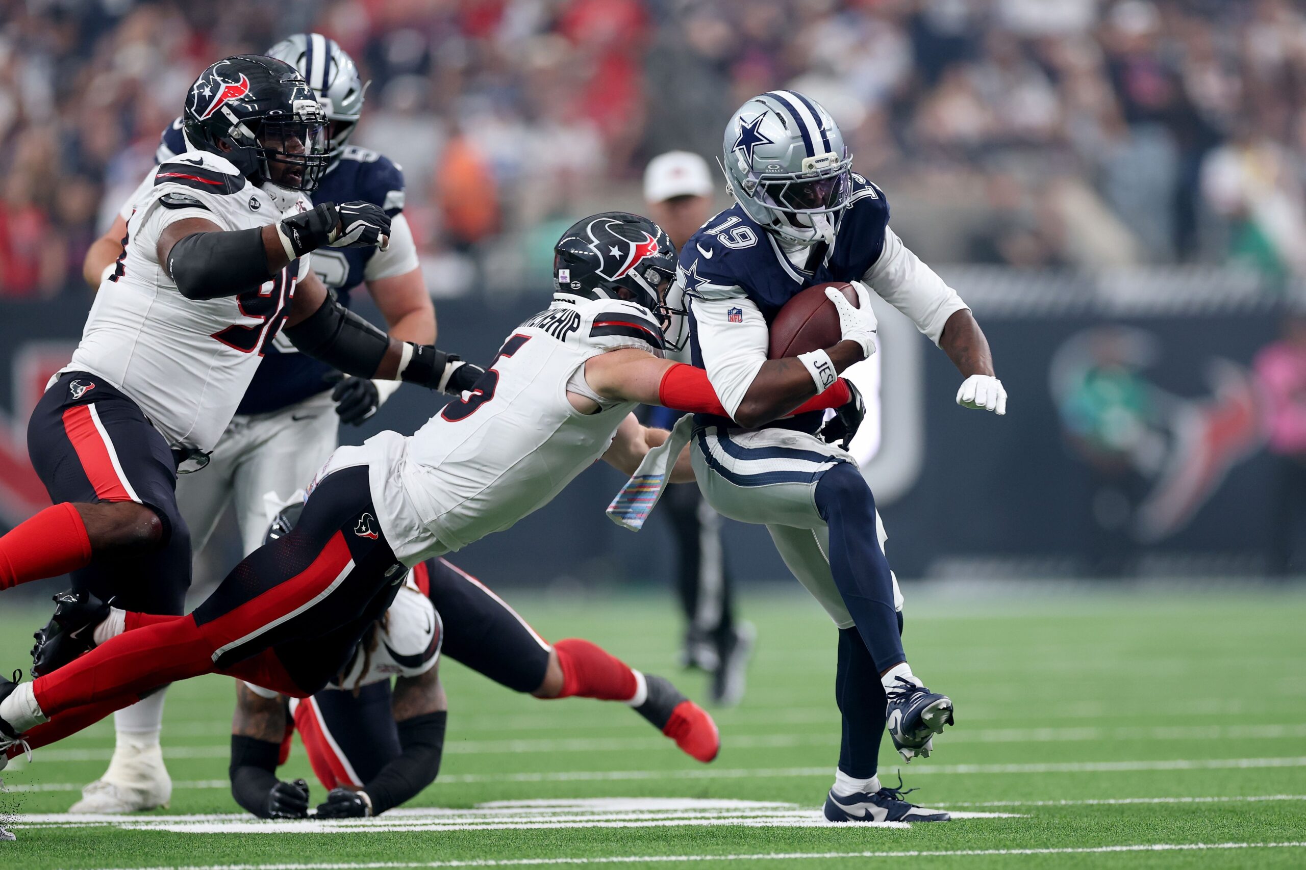 <i>Tim Warner/Getty Images via CNN Newsource</i><br/>The Houston Texans' Reed Blankenship tackles the Dallas Cowboys' Ryan Flournoy on Sunday.