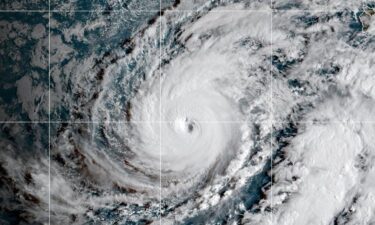 This satellite image released by NOAA shows Hurricane Lowell approaching Hawaii
