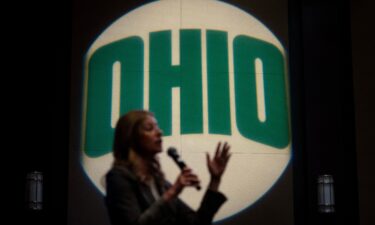 Democratic gubernatorial candidate Dr. Amy Acton speaks with supporters during a campaign event along the Ohio River