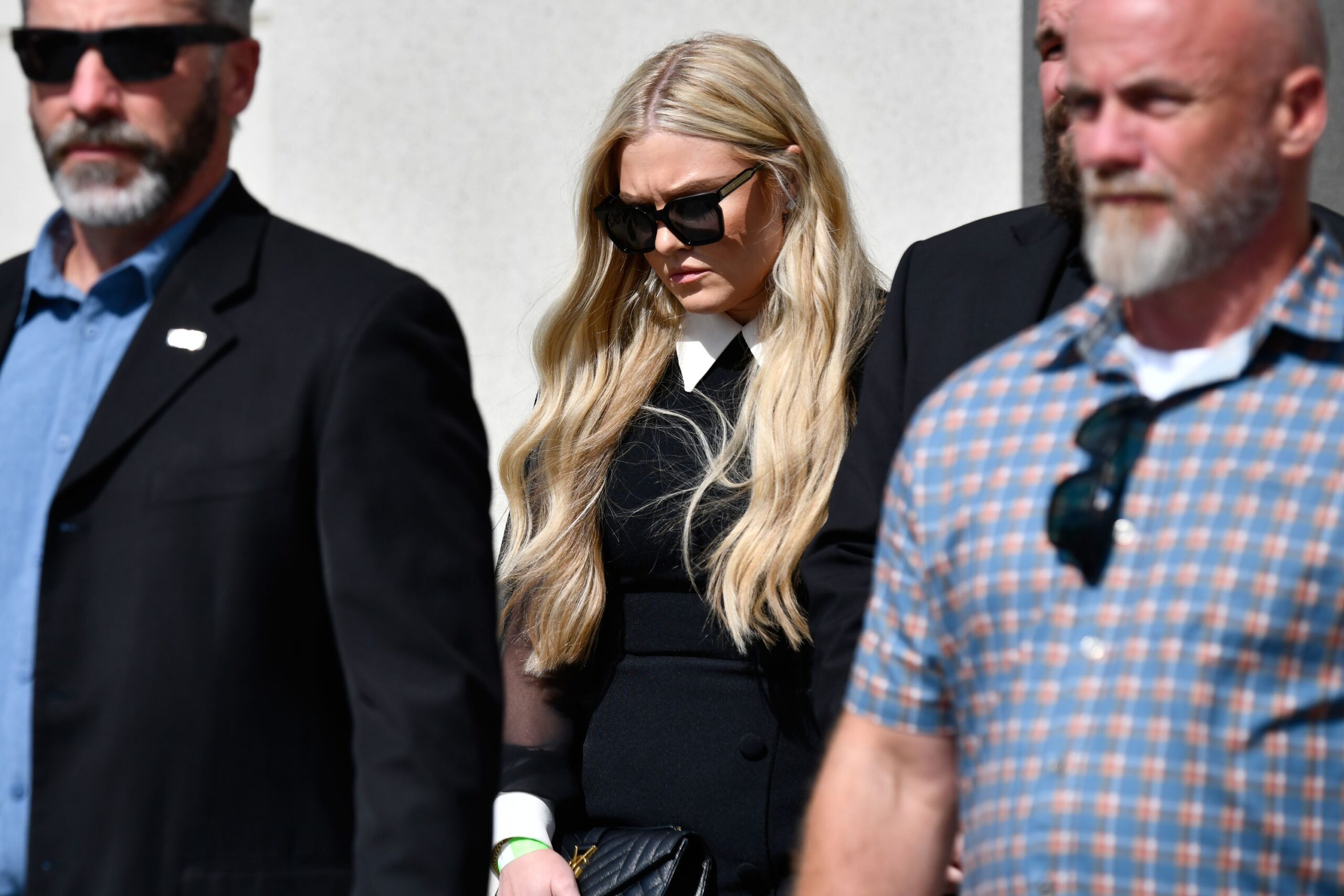 <i>Marielle Scott/AP via CNN Newsource</i><br/>Erika Kirk leaves the Fourth District Courthouse in Provo