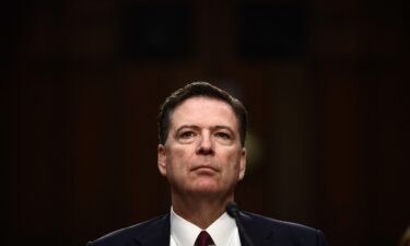 Former FBI Director James Comey arrives to testify during a US Senate Select Committee on Intelligence hearing on Capitol Hill in Washington
