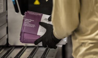 An election worker sorts ballots during early voting ahead of the midterm election at San Francisco County's election operations facility at City Hall in San Francisco