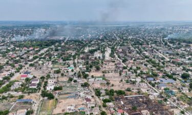 Smoke rises from a residential neighborhood in the Russian-occupied city of Oleshky in the Kherson region of Ukraine on September 22