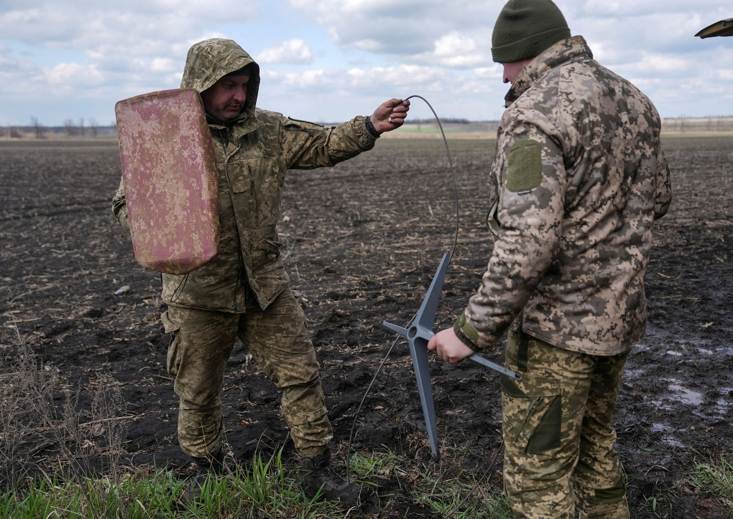 <i>Inna Varenytsia/Reuters/File via CNN Newsource</i><br/>Servicemen of the 68th Oleksa Dovbush Separate Jaeger Brigade of the Armed Forces of Ukraine set up Starlink satellite internet system